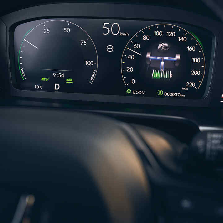 Close-up van het digitale bestuurdersdisplay van de Honda CR-V Hybrid.