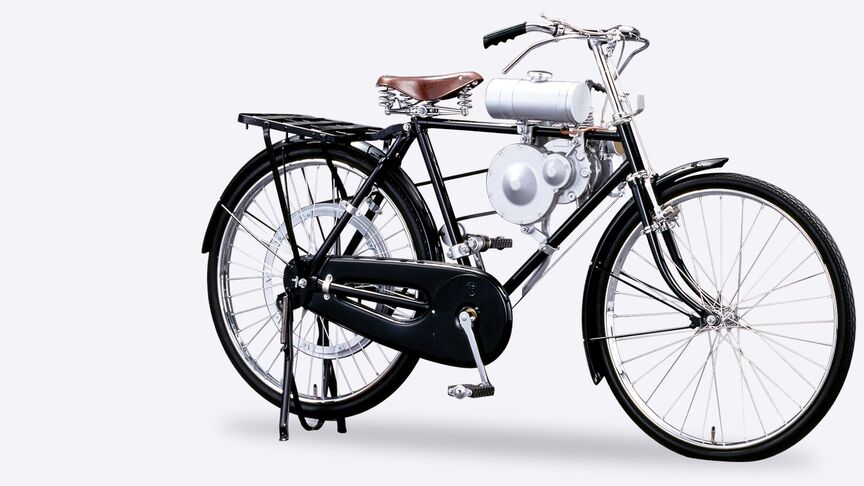 Zijaanzicht van Honda Type A-fiets met een omgezette stroomgenerator.