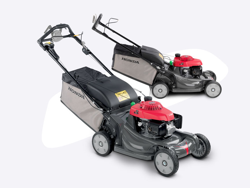 2x Honda HRX-grasmaaiers, driekwart vooraanzicht, zicht op rechterkant.