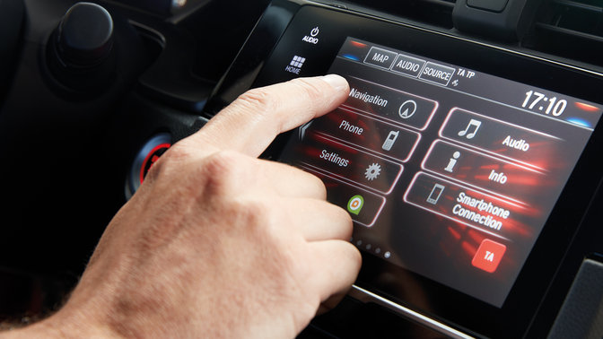Close-up van Honda CONNECT-infotainmentsysteem met Garmin-navigatie.