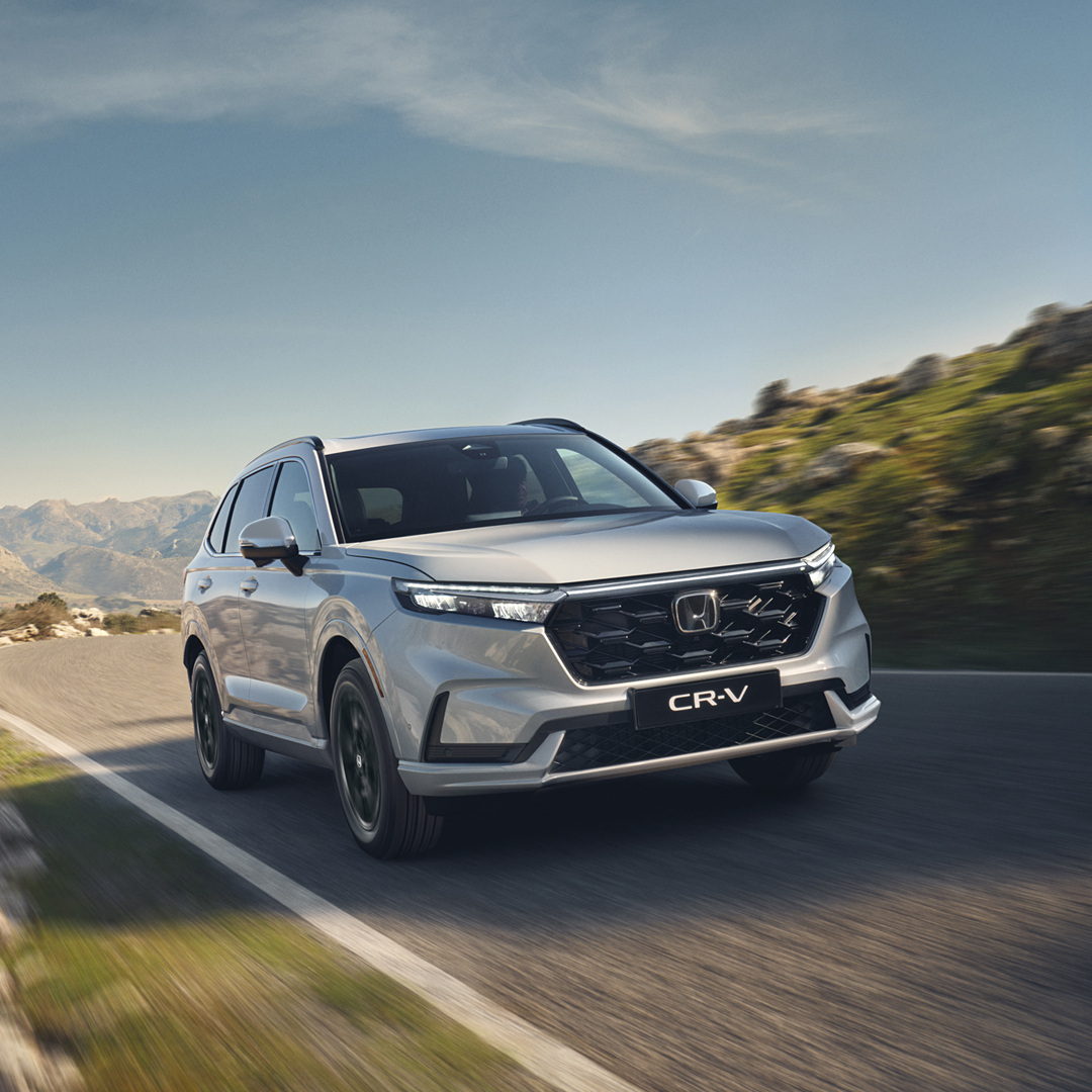 Witte CR-V toont plugin-gebied