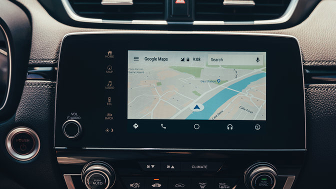 Close-up vanaf de zijkant van de pictogrammen van het touchscreen van de Honda CR-V Hybrid.