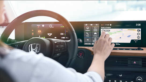 Close-up infotainment display van de Honda e.