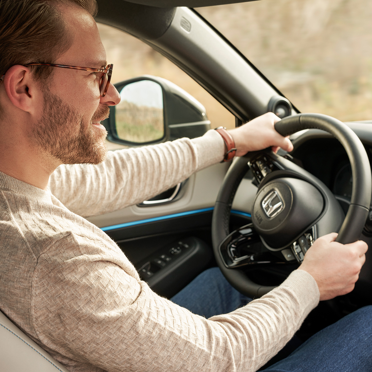 Man die stuurwiel vasthoudt. 