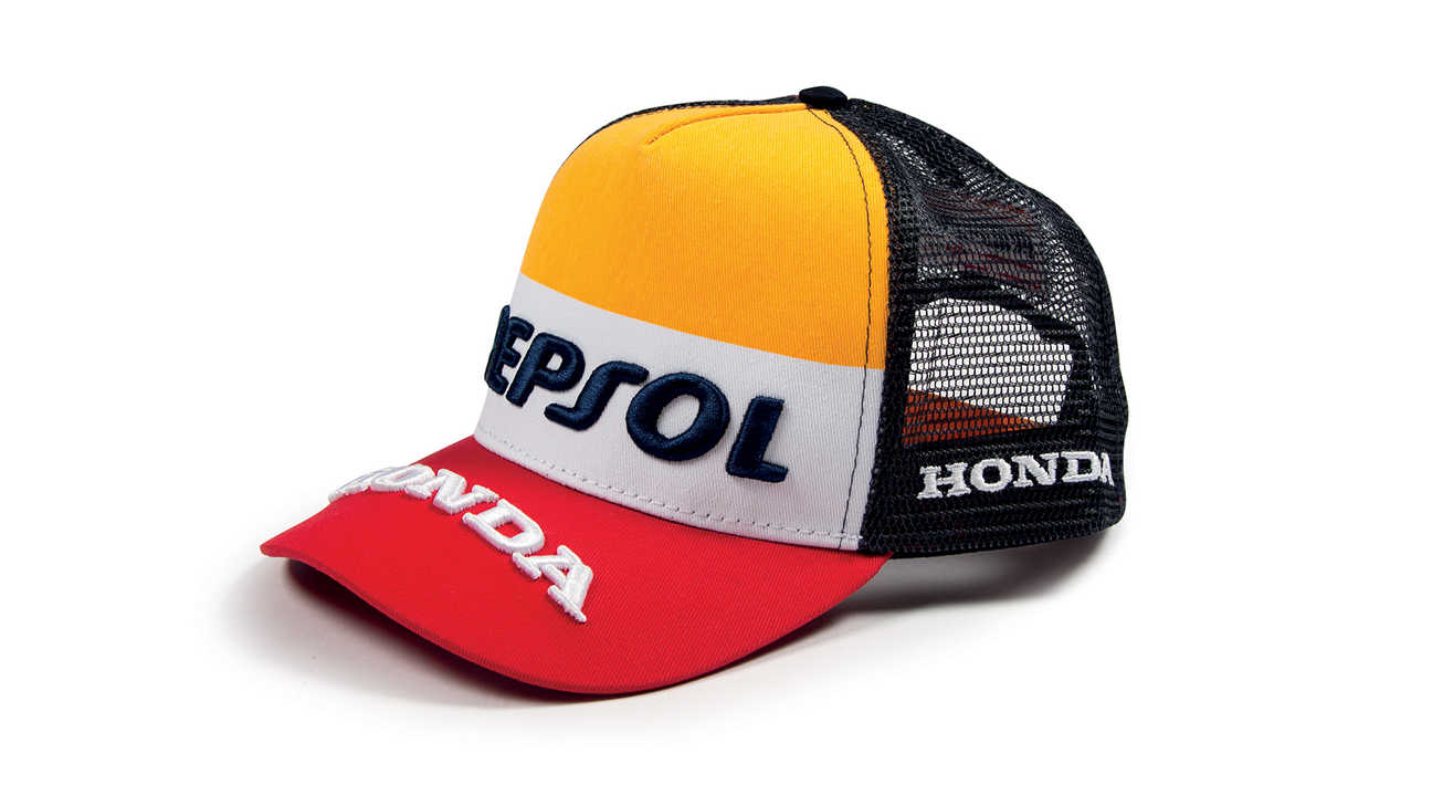 Oranje, witte en rode cap met Honda MotoGP-kleuren en Repsol logo.