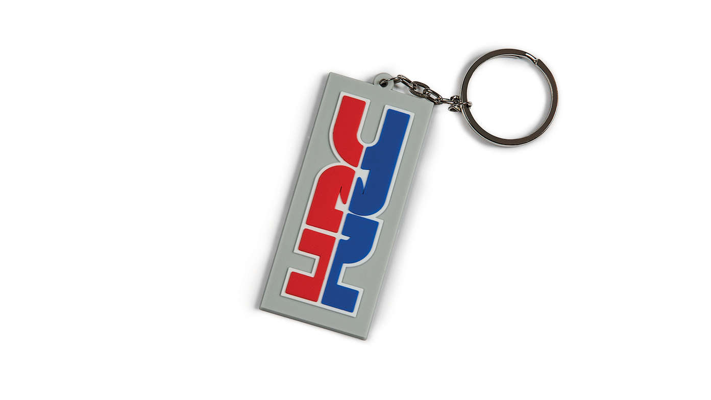 Grijze Honda HRC-sleutelhanger met HRC-kleuren en Honda Racing Corporation logo.