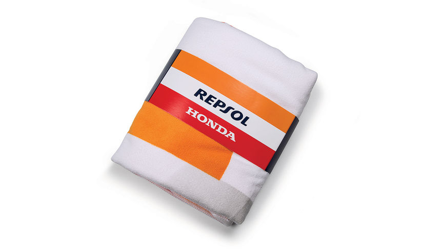 Honda Repsol strandlaken met Honda MotoGP-kleuren en Repsol logo.