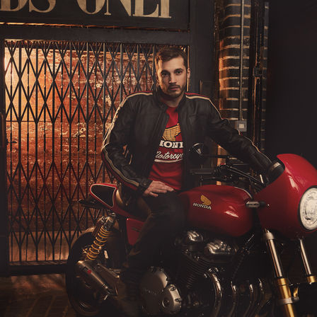 Man in vintage Honda t-shirt.