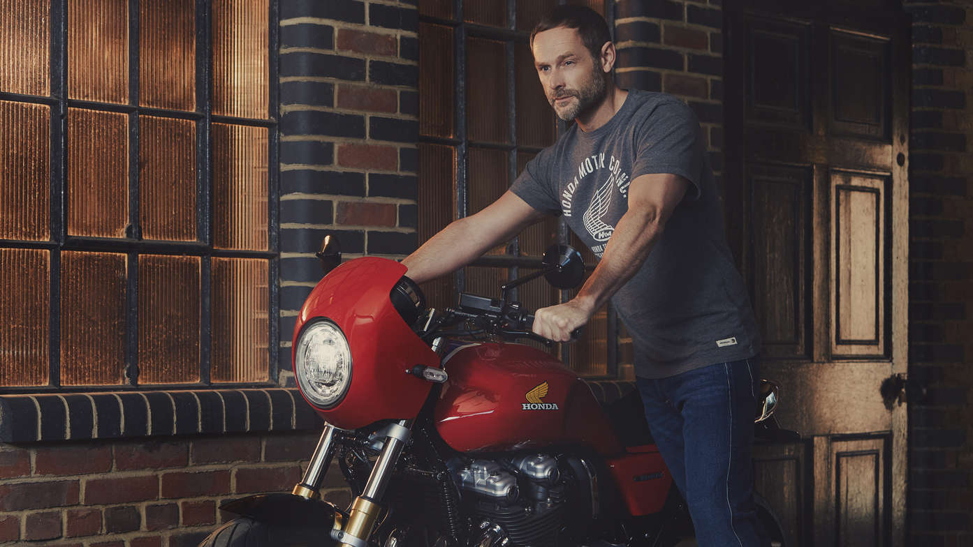 Man in vintage Honda T-shirt.